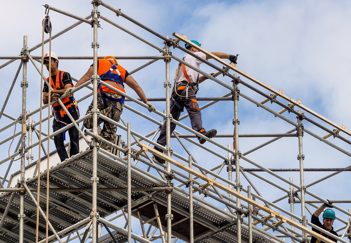 HKL Scaffolding workers assembling safe and stable scaffolding structures for construction projects in Singapore.